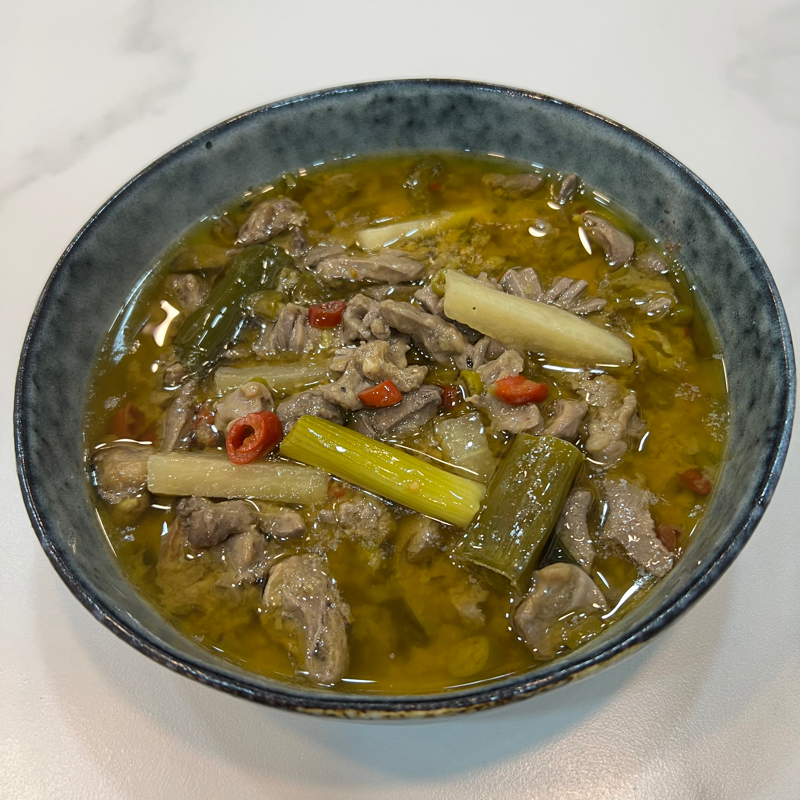 Abattis de volailles sautées aux piments vinaigrés