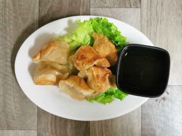 E2 Raviolis grillés au porc et chou chinois (6ps)