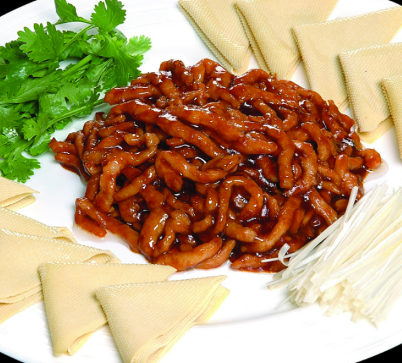 Emincé de porc sauté à la sauce pékinoise