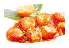 29 Coquilles St-Jacques à la sauce piquante