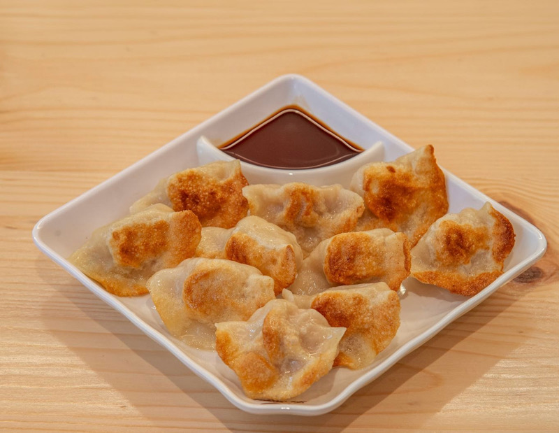 RAVIOLIS GRILLES Porc et chou blanc/10p 猪肉白菜馅煎饺