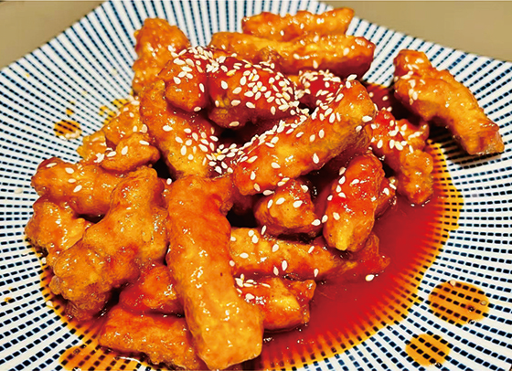 Fried pork tenderloin in sweet and sour sauce