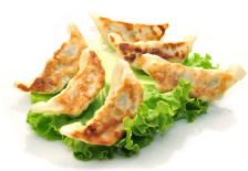 E1. Raviolis japonais ( 4 pièces)