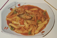 Gâteau de riz aux fruits de mer sauté à la sauce piquant