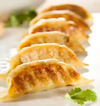26. GYOZA, Pan-fried beef dumplings (6 pieces)